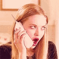 Gif from Mean Girls: Karen Smith listening to a phone call that outrages her