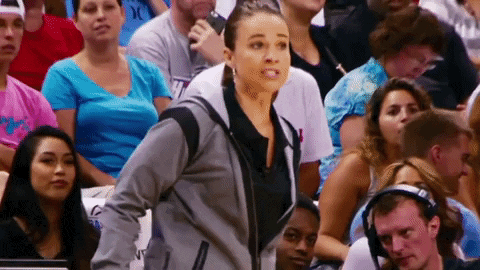 Gif of San Antonio Spurs' coach Becky Hammon, yelling at play on the court