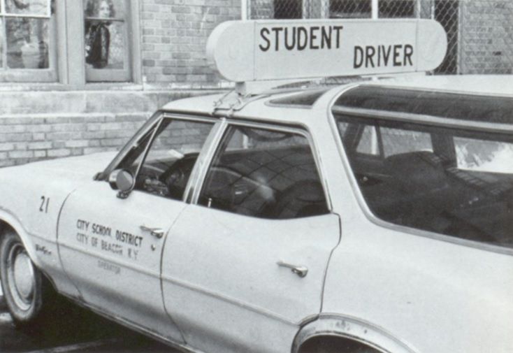 Photo of a 1950s station wagon, from Beacon NY public school, bearing Student Driver placard